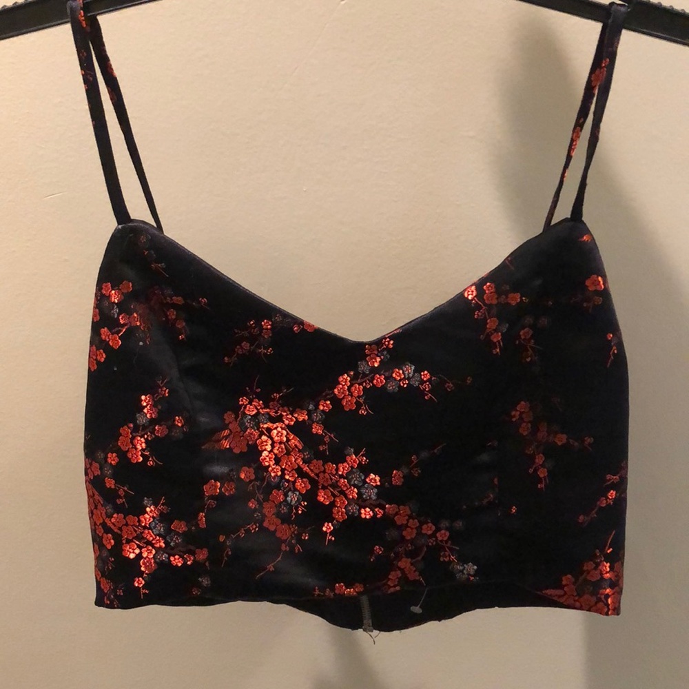 A satin feeling flower patterned crop top